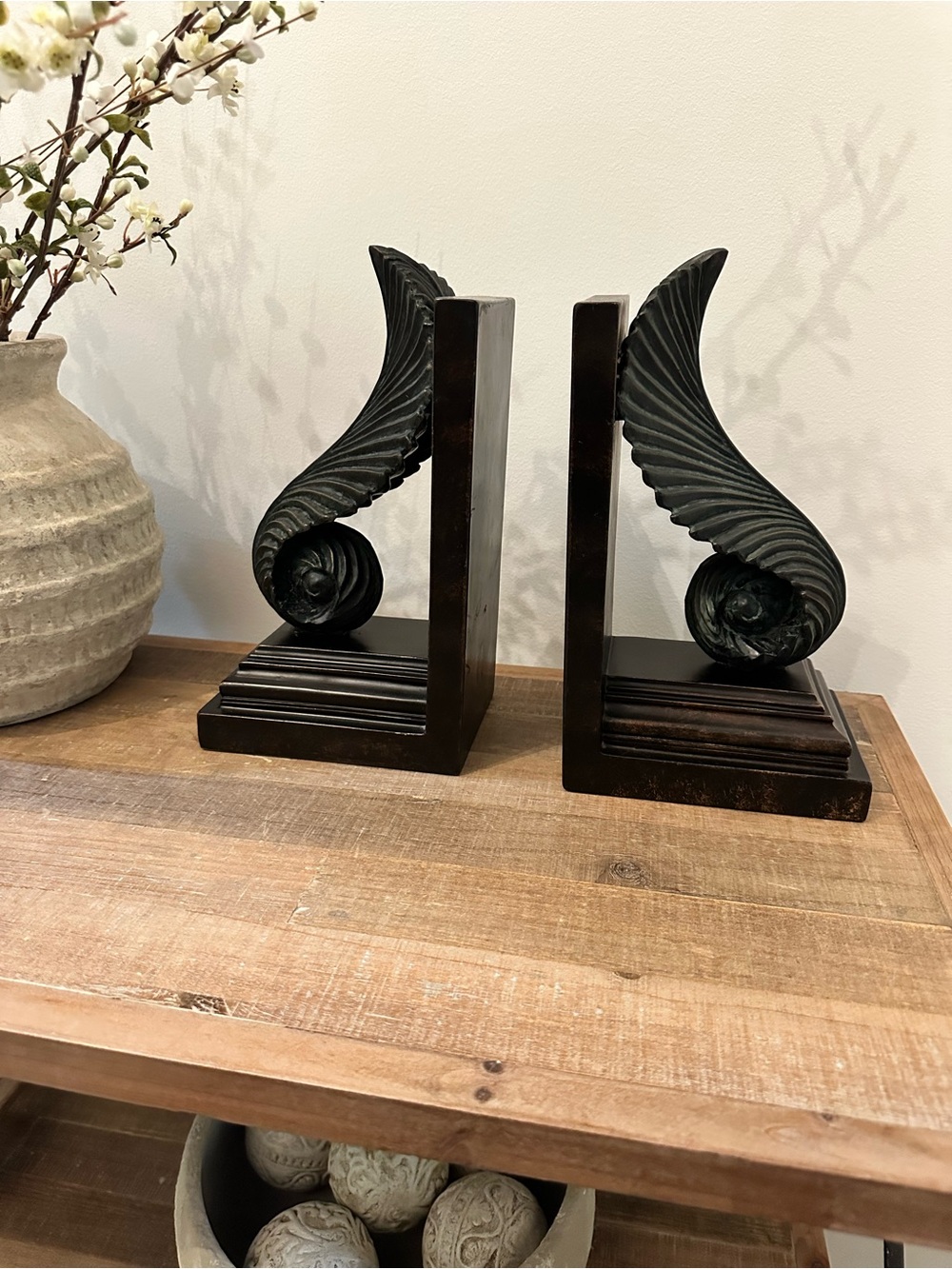 Pair Decorative Black Winged & Scroll Motif Shell Bookends Stepped Wooden Base